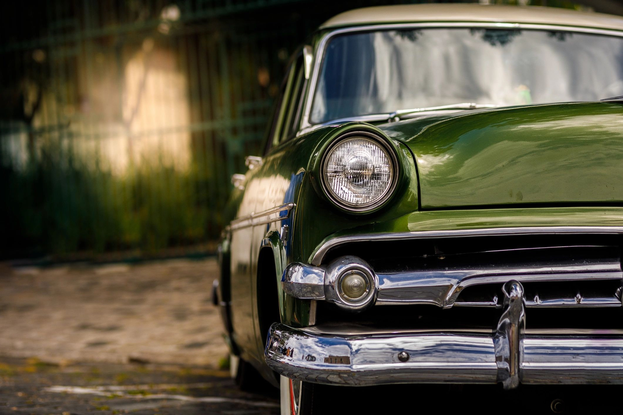 Behind the scenes of a car photoshoot with crew and equipment