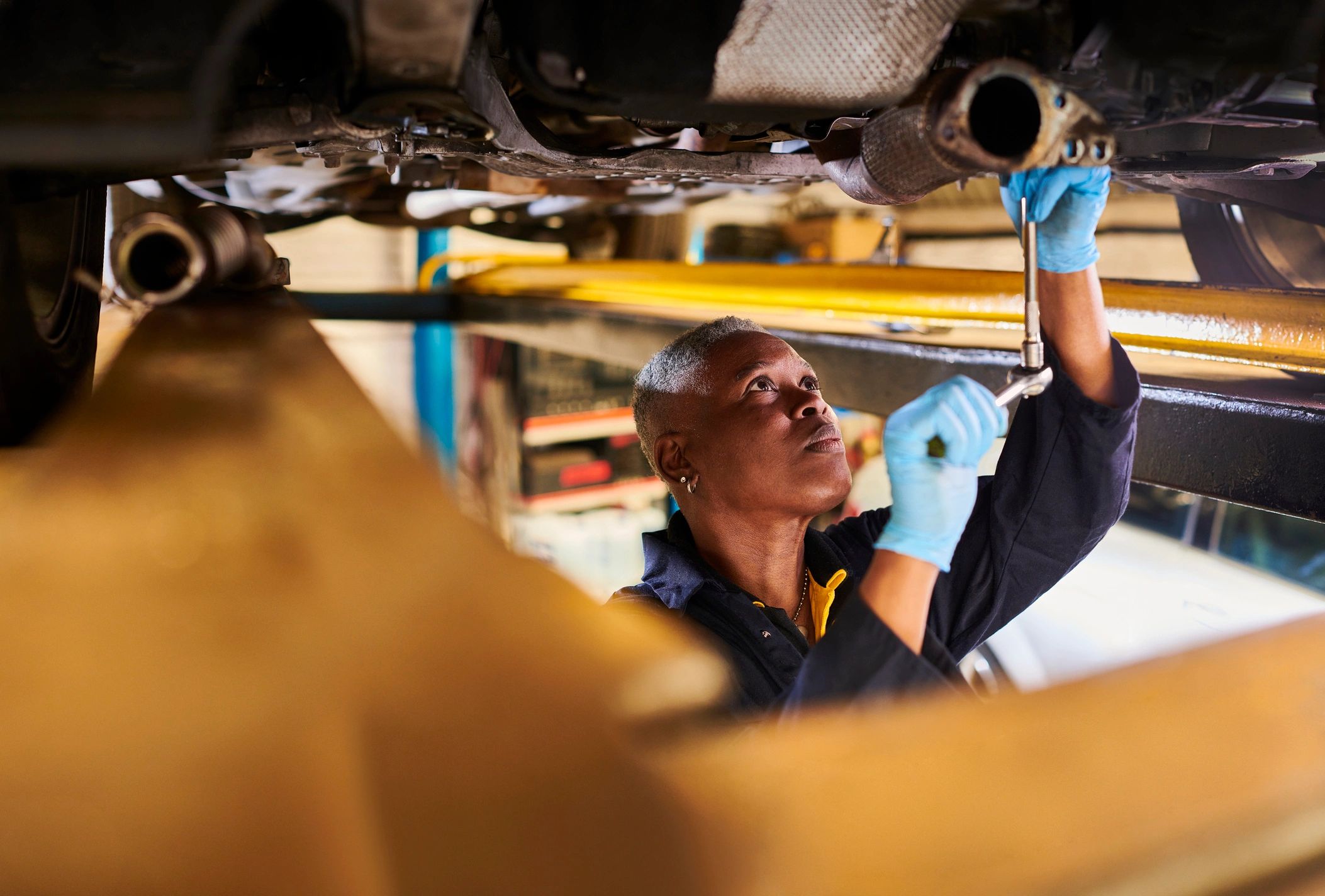 Person working in a garage setting