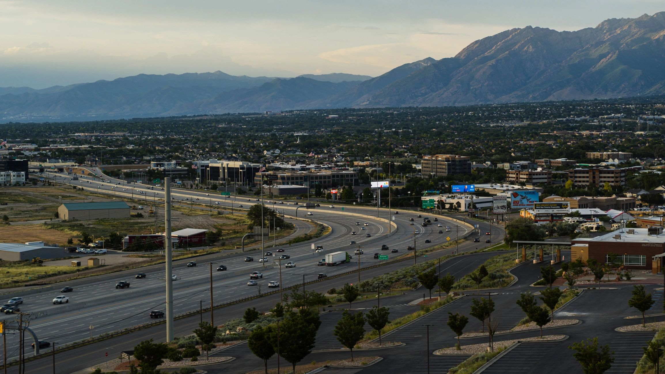 Interstate highway traffic with mountains in the background