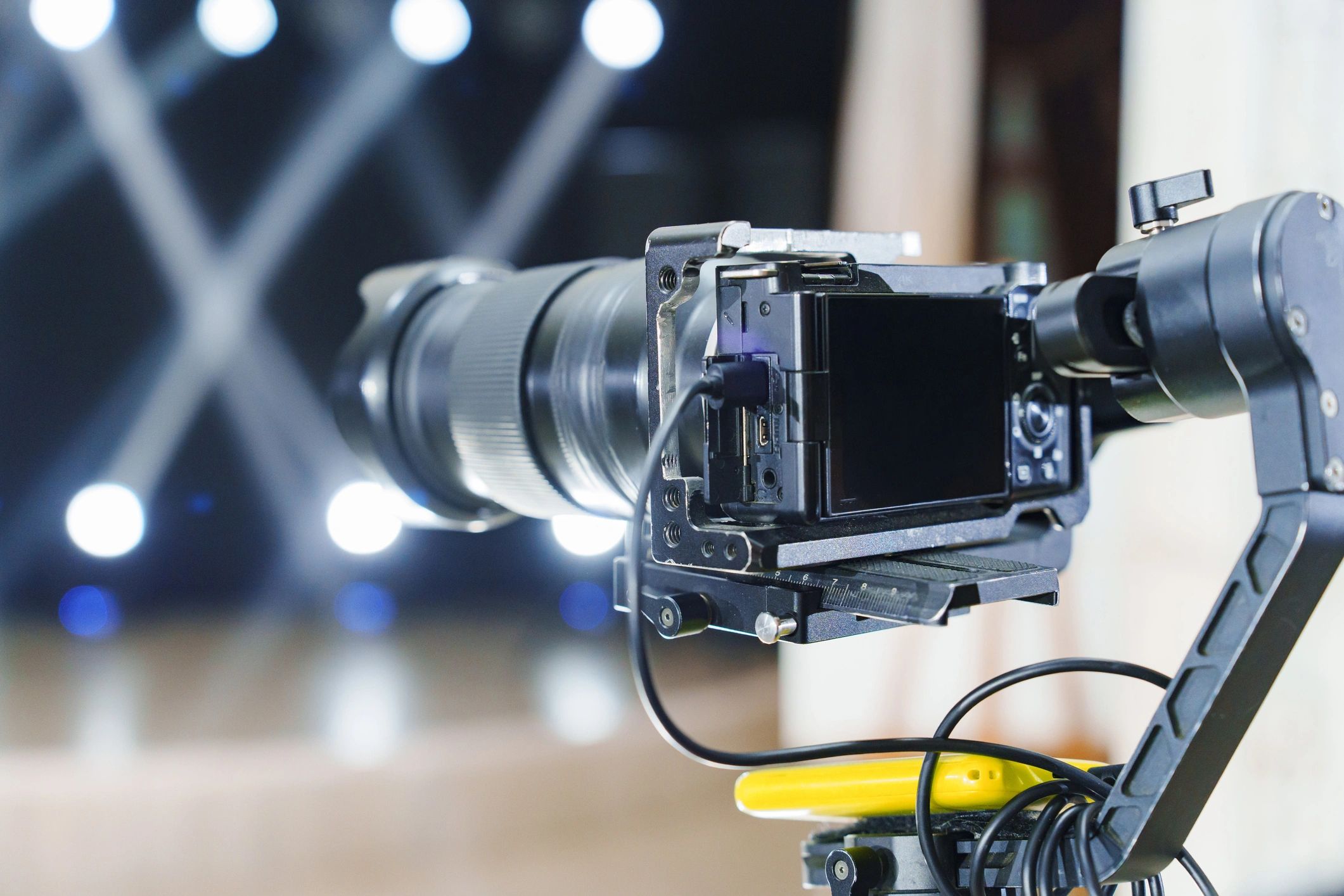 Professional camera set up with cables and bright background lights