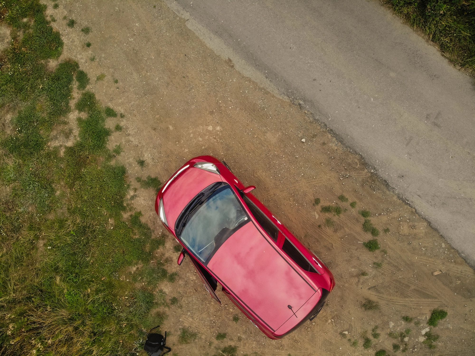 Car on an open road at golden hour