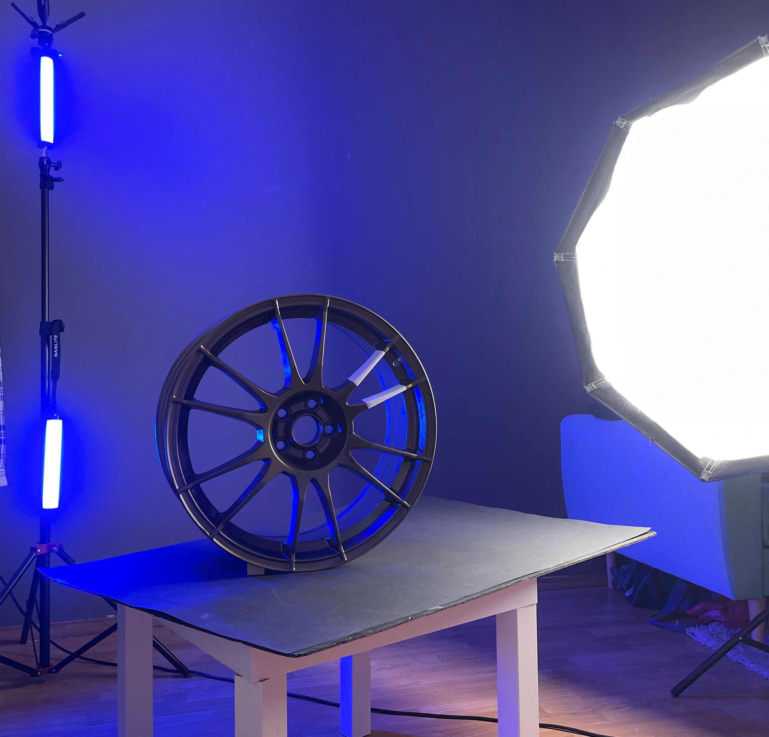 Car wheel in a studio with colorful lighting